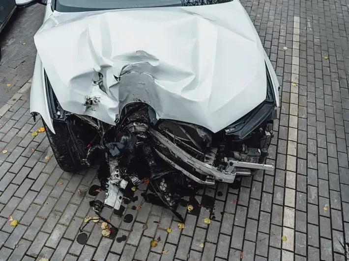 Tempe illegal left turn accident attorney reviewing crash evidence near Mill Avenue District intersection